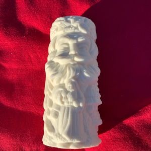 Ivory color ceramic Santa candle holder.